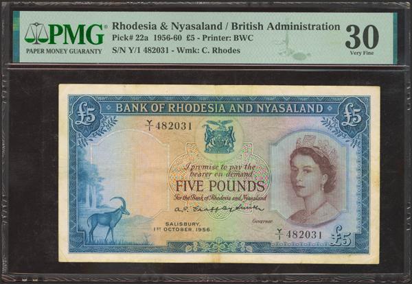 8624 - RHODESIA AND NYASALA. 5 Pounds. 1 October 1956. British Administration. (Pick: 22a). Extremely rare, especially without repairs. PMG30 (stain). - 285€